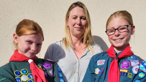 Georgia and Evie with their mother