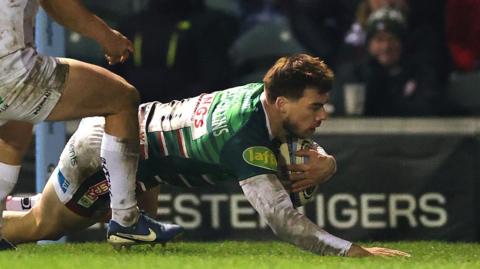 Ollie Hassell-Collins scores against Exeter