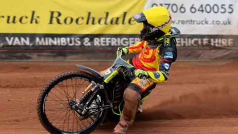 Tom Brennan of the Birmingham &#039;Curtis Sport&#039; Brummies is competing during the Rotor Motor Oil Premiership match between the Belle Vue Aces and the Birmingham Brummies at the National Speedway Stadium in Manchester, on May 6, 2024