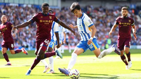 Brighton's Kaoru Mitoma in action against Ipswich in the Premier League