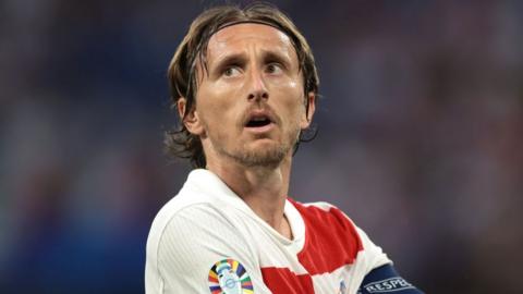 Luka Modric looks up during a game for Croatia 