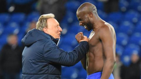 Neil Warnock and Sol Bamba celebrate