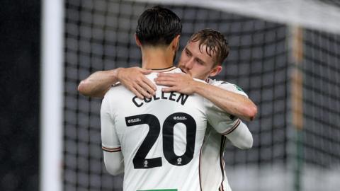 Swansea strikers celebrate win over Gillingham