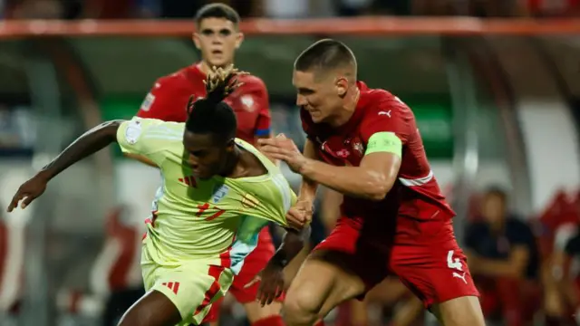 Nikola Milenkovic in action for Serbia against Spain