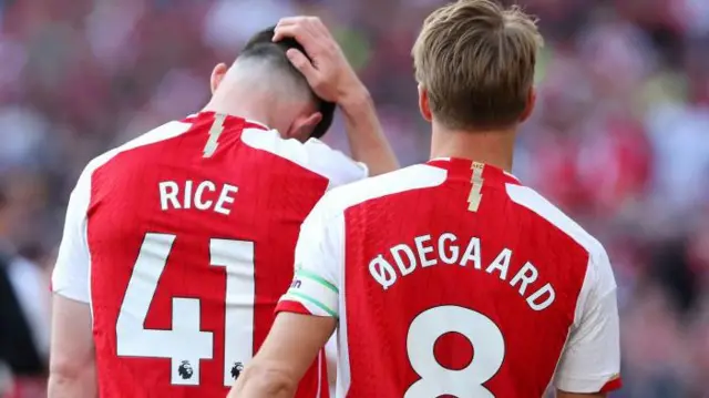 The back of Declan Rice's and Martin Odegaard's Arsenal shirts