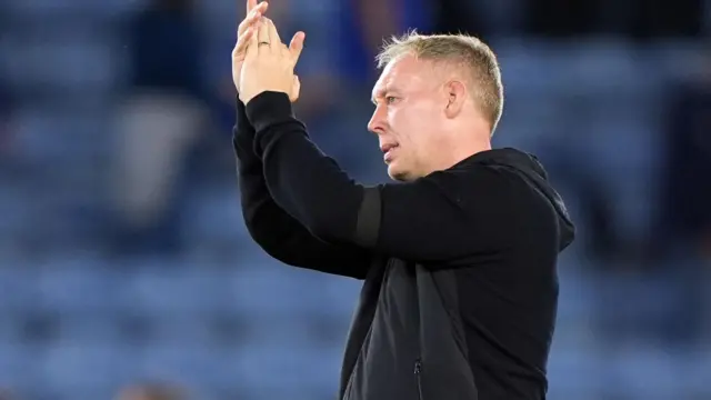 Steve Cooper applauds