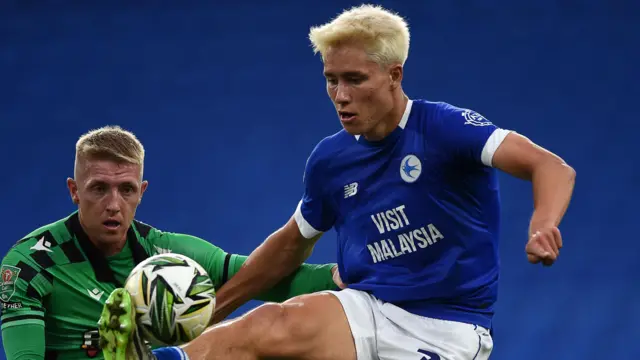 Cardiff City forward Rubin Colwill in action against Bristol Rovers