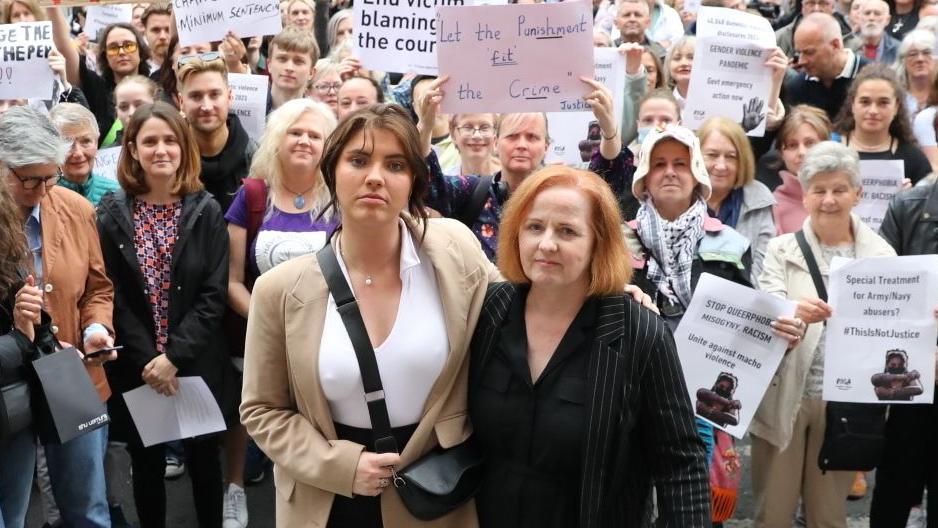 Natasha O'Brien and Ruth Coppinger at a protest outside Leinster House in Dublin