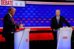 Donald Trump and Joe Biden speak during a debate in June