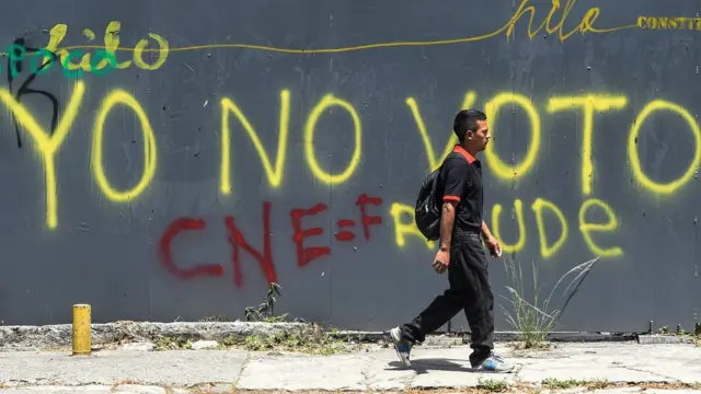 Mural em Caracas com frase pedindo para não votar