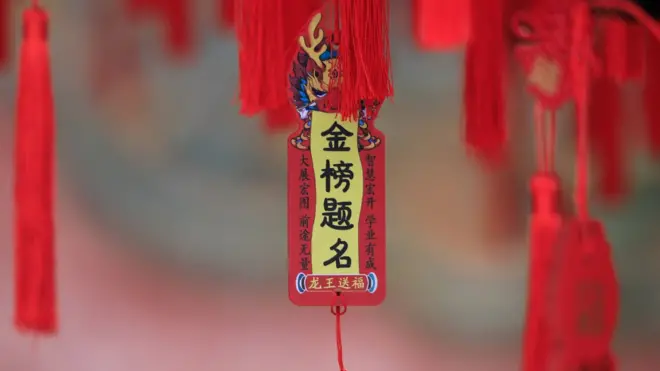 A prayer card for students' good luck in the upcoming 2024 Gaokao, China's National College Entrance Examination, is hung at Harbin Confucius Temple on June 2, 2024 in Harbin, Heilongjiang Province of China