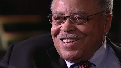 American actor James Earl Jones smiles as he's asked a question about voicing Darth Vader