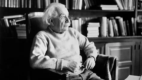 Albert Einstein sitting down in a study (Credit: Getty Images)