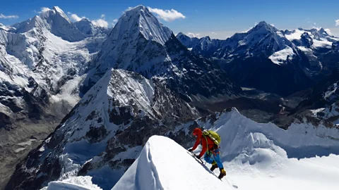 Hari Mix scaling a mountain in the Himalayas (Credit: Hari Mix)