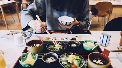 D3sign/Getty Images Dining alone is a cultural norm in Japan with many eateries offering seating for solo diners (Credit: D3sign/Getty Images)