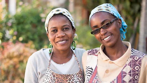 Chad Case/Alamy Two woman smiling in Namibia