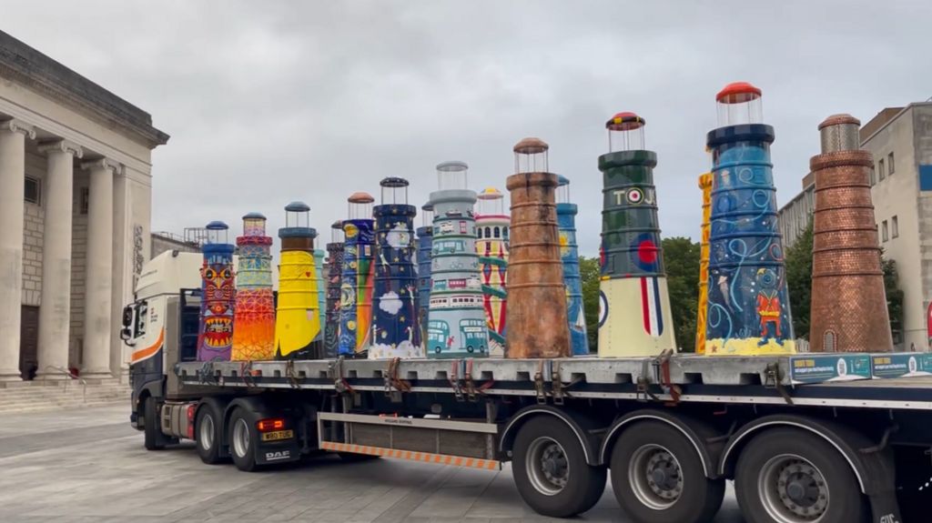 Painted lighthouses on a flatbed lorry at Southampton's Guildhall Square