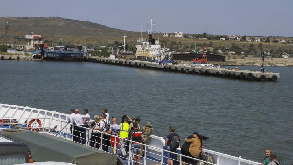 A ferry carrying vehicles travels on the shores of Port Kavkaz in Krasnodar in 2023