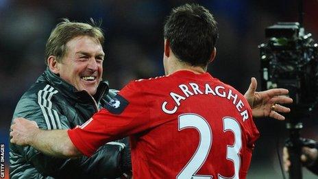 Liverpool manager Kenny Dalglish celebrates the Carling Cup win over Cardiff City