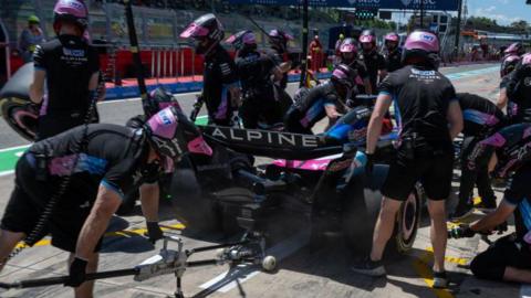 The back of an Alpine car during a pit stop