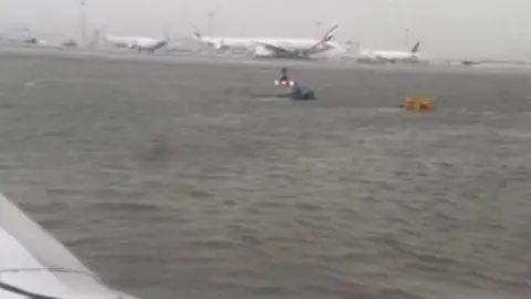 Reuters/Zaheer Kunnath Dubai International Airport resembled a lake during the storm, videos posted on social media showed