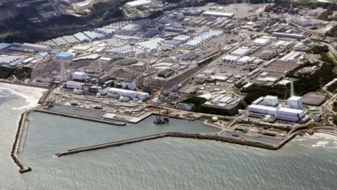 Reuters An aerial view shows the Fukushima Daiichi nuclear power plant, which started releasing treated radioactive water into the Pacific Ocean, in Okuma town, Fukushima prefecture, Japan August 24, 2023, in this photo taken by Kyodo.