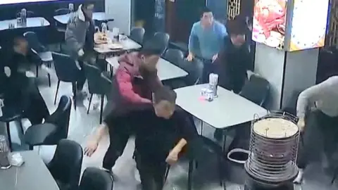 Customers scramble to get out of restaurant