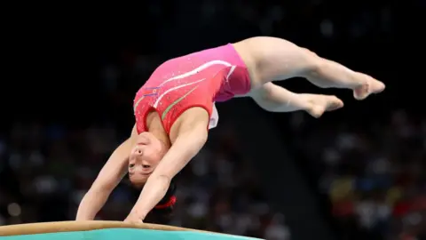 Getty Images An Chang-ok performs a vault