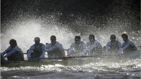 Getty Images Cambridge rowing boat with water splashing up