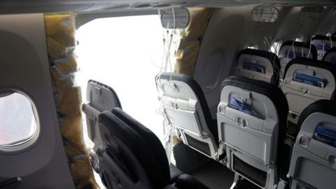 Opening seen in the fuselage of Alaska Airlines Flight 1282 after incident on 5 January