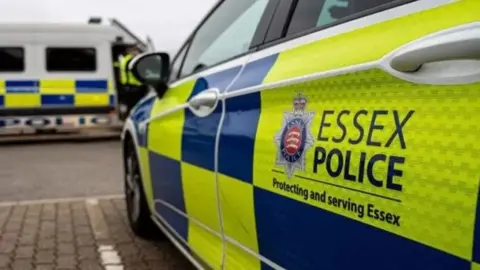 Essex police car parked in a bay