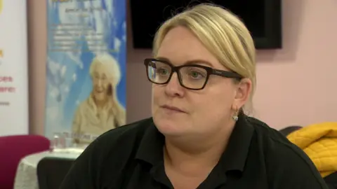 Gemma McKeron who has blond hair and glasses