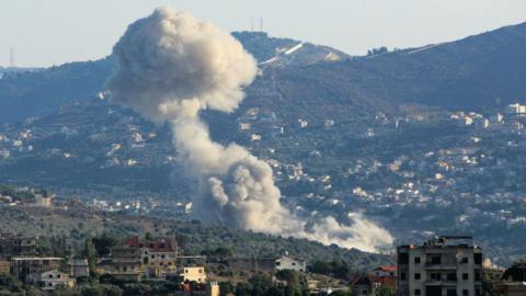 Smoke rises from Kfar Kila, a village in southern Lebanon