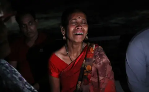 Family members of stampede victims mourn outside a hospital in Hathras, Uttar Pradesh, India, 02 July 2024