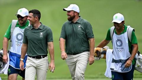 Shane Lowry, Rory McIlroy and Harry Diamond on the course at the Tokyo Olympics