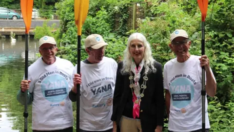 Rod Hunt, 85, John Rampling, 84 and Henry Kilvert, 70, pose with Lord Mayor of Norwich