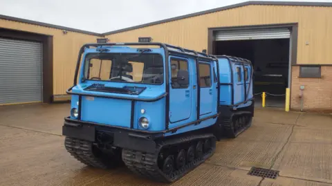 Shoeburyness Range A blue amphibious vehicle with two cabins and on tracks