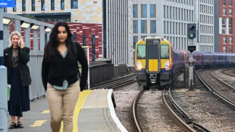 Getty Images Train arrives in a station