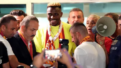 Victor Osimhen is met by fans as he arrives in Istanbul to complete his loan transfer to Galatasaray