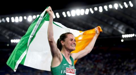 Ciara Mageean holds the Irish flag aloft after winning the women's 1500m title at the European Championships in Rome