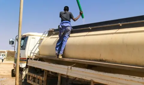 Getty Images A man fills water for transport into a tanker on April 03, 2017 in Kebri Dahar, Ethiopia.