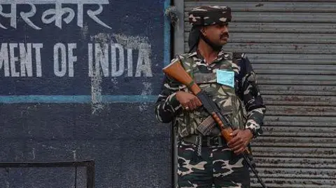 An Indian security personnel stands guard along a street during India's Independence Day in Srinagar, Jammu and Kashmir, on August 15, 2024. Photo Getty Images