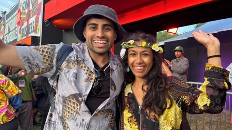 Two fans outside Glastonbury's new South Asian space