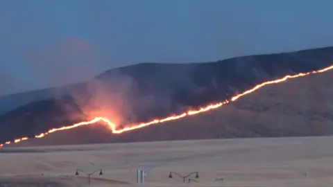 Wide shot of wildfire in California