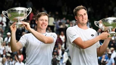 Henry Patten and Finland's Harri Heliovaara with their trophies