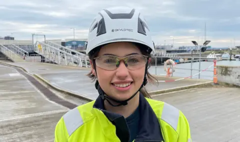Apprentice Megan Dorsett on the quayside at the Port of Lowestoft