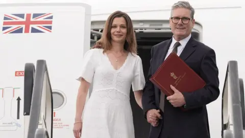 Keir Starmer and his wife Victoria board a plane at Stansted Airport in Essex as they head to Washington DC to attend a Nato summit