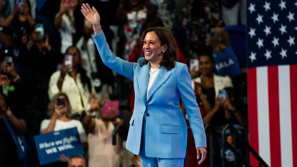 Harris at an event in Atlanta waving to the crowd