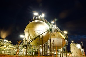 Two sphere gas storage in petrochemical plant at night