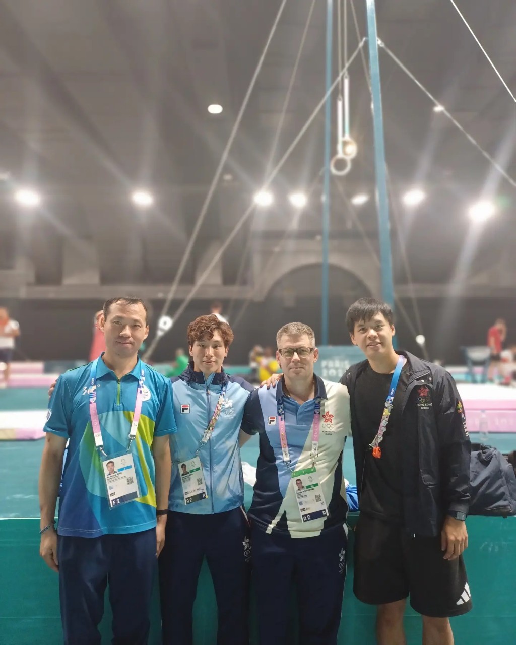 奥运体操裁判袁家强(左起)、石伟雄及塞治教练一起出战奥运。 网上图片